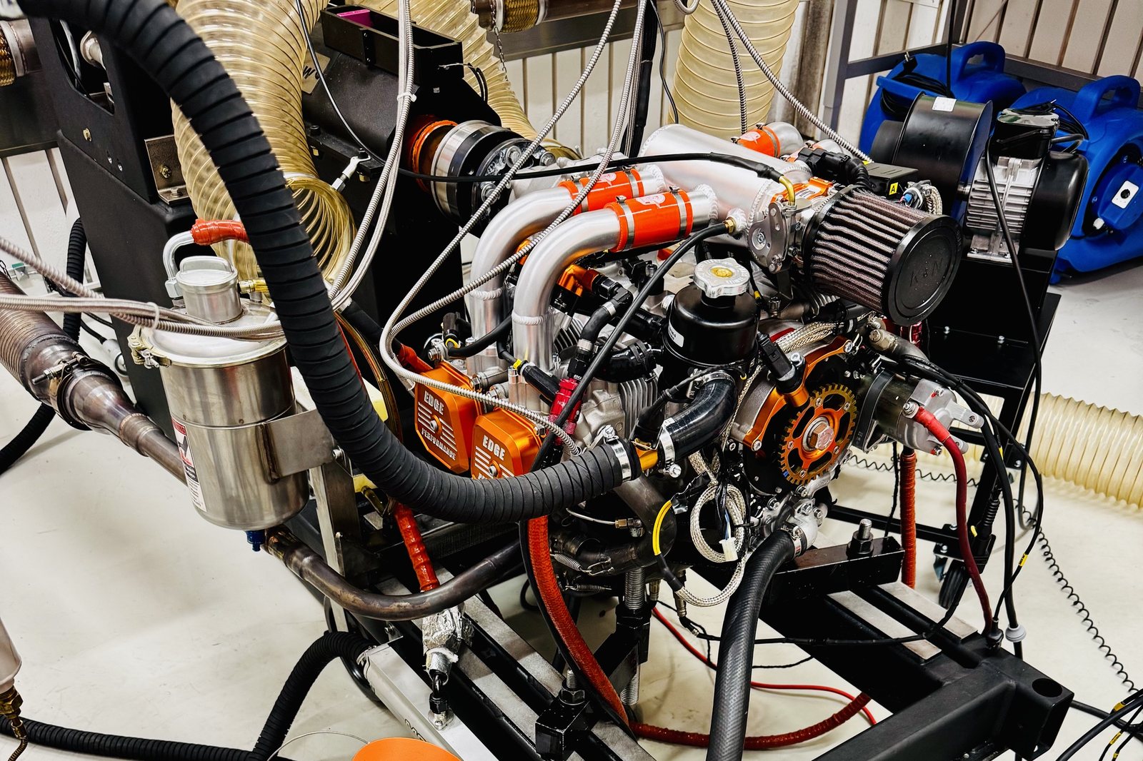 Aircraft engine on a dynamometer cart with cooling blowers and ducting at EdgePerformance