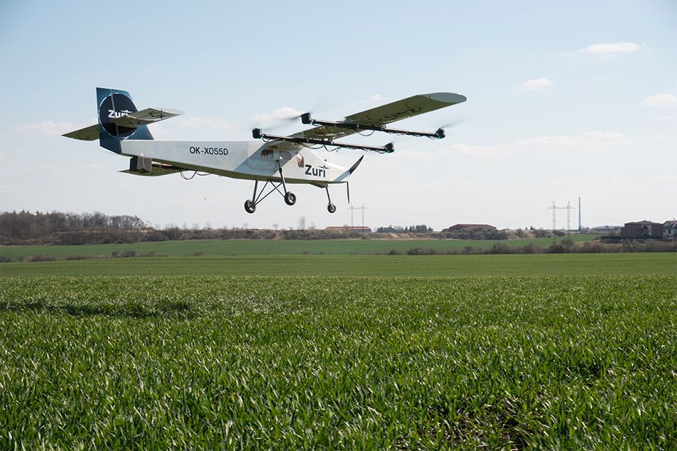 The five-meter proof of concept hovering low over a field in 2018