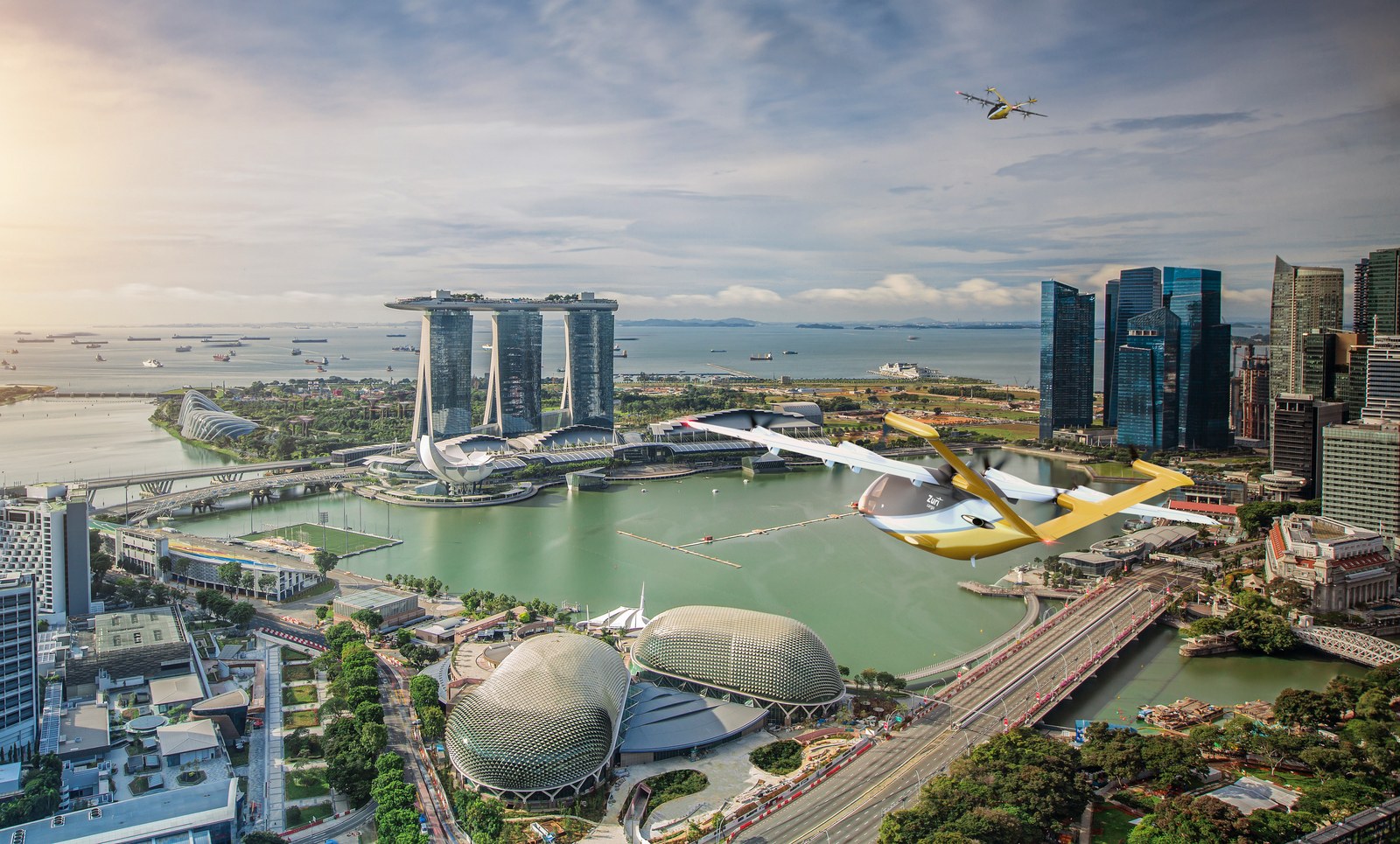 Render of a Zuri aircraft in cargo livery flying over a city waterfront, a second aircraft in the distance