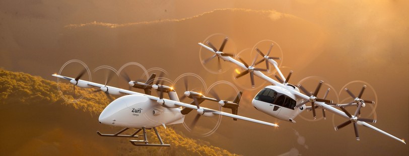 Render of the uncrewed cargo aircraft and the six-seat passenger aircraft in close formation against a golden sky