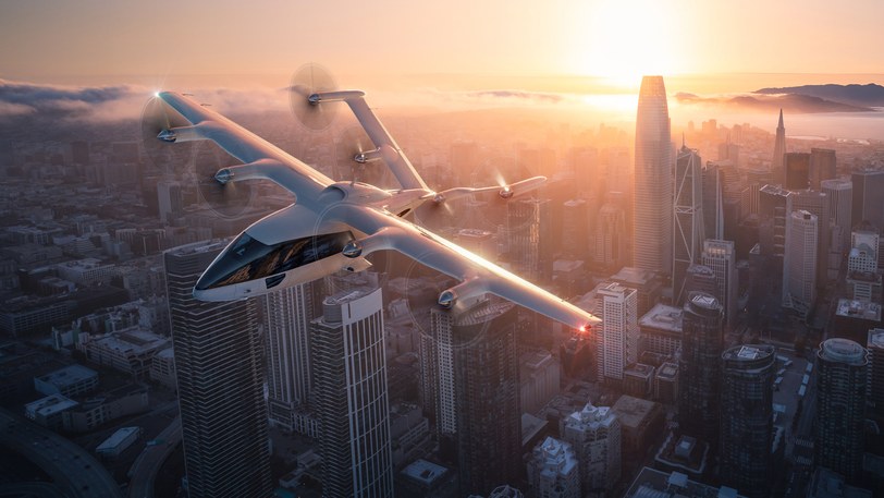 Render of the six-seat aircraft in cruise above a city skyline at sunset