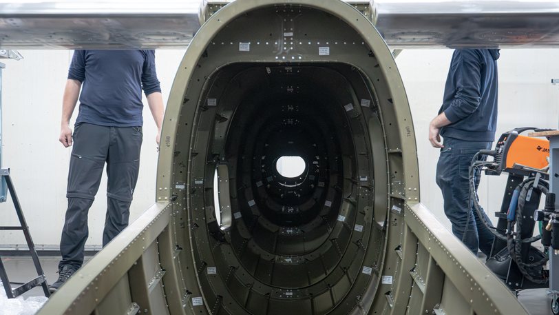 The TD 2.0 fuselage frames lined up in their assembly jig in the Prague hall
