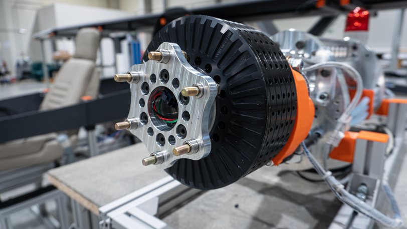 Close view of a Zuri propulsion unit hub and its mounting flange on the airframe