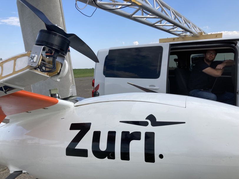 Close view of the Zuri V1NG demonstrator nose and livery on the ground before a test flight
