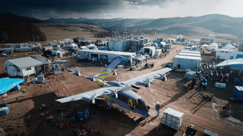 Zuri Hybrid VTOL carrying cargo over rugged terrain to a forward base