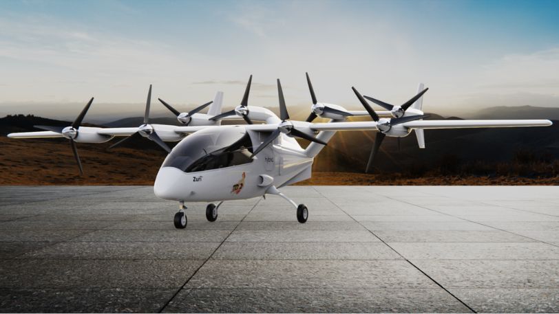 Hero render of the Zuri TD 2.0 hybrid VTOL technology demonstrator on a runway at sunrise.