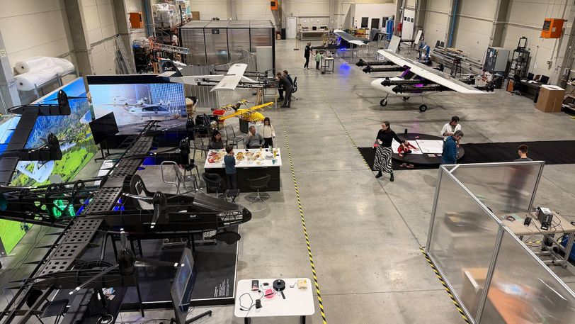 Zuri R&D workshop overview during Family Day with aircraft demonstrators and families.