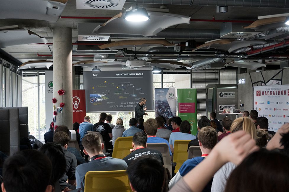 Presentation to a full room during Zuri’s early 2019 growth phase, when the team expanded to include aerospace engineers, aerodynamicists, and software specialists