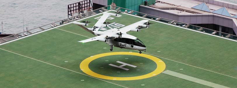 Zuri Hybrid VTOL landing on rooftop helipad, highlighting ability to use existing pads, heliports, and unprepared sites.