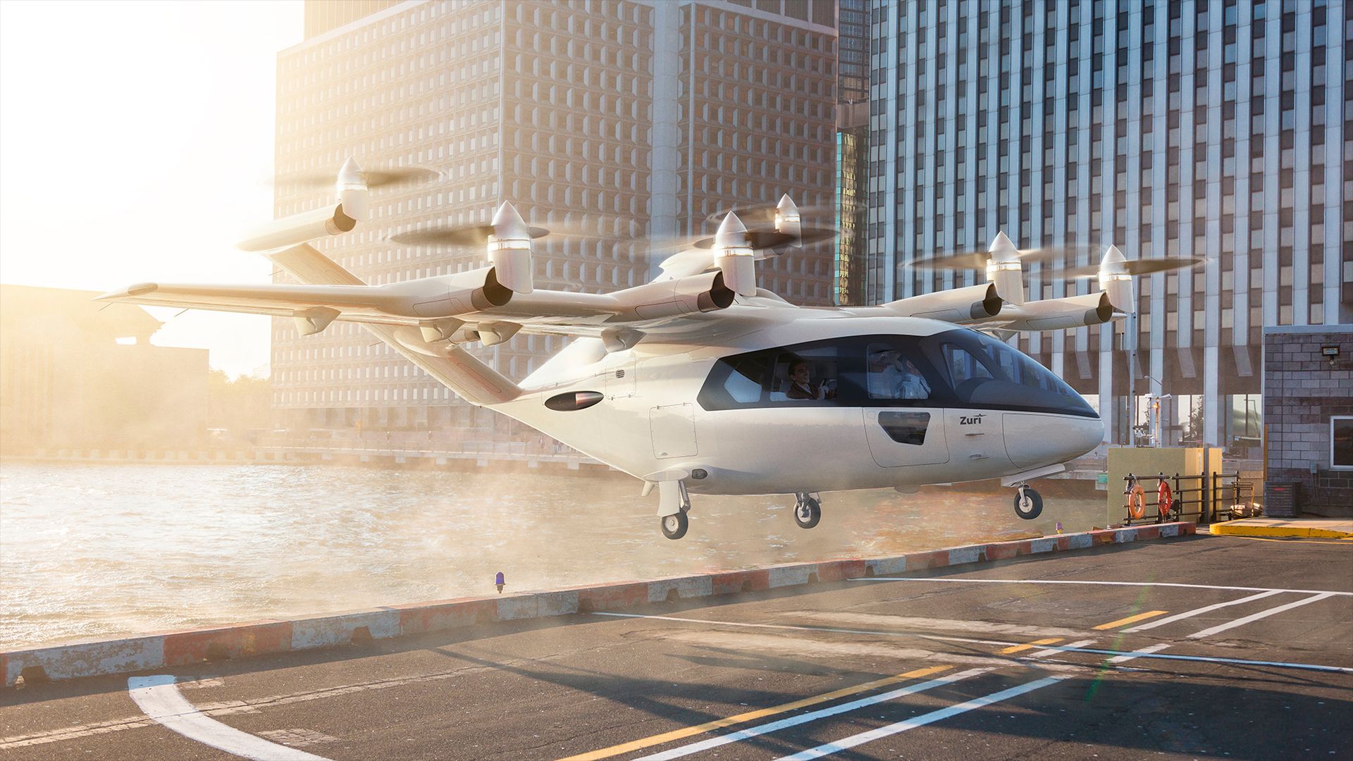 Zuri Hybrid VTOL aircraft hovering above a city waterfront landing zone with passengers onboard, illustrating urban air mobility and real-world infrastructure integration