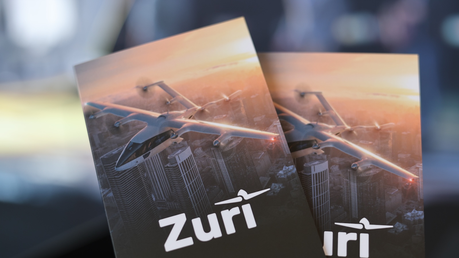 Zuri Hybrid VTOL brochures featuring regional air mobility concept shown at AERO Friedrichshafen 2025